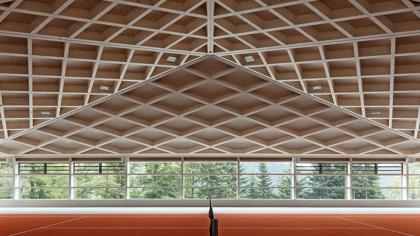 Techos geométricos de madera cubren canchas de tenis en Suiza - Madera21